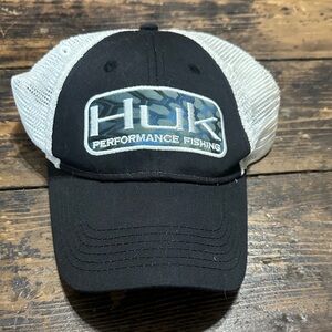 Huk Black Front with White Mesh Logo Trucker Hat